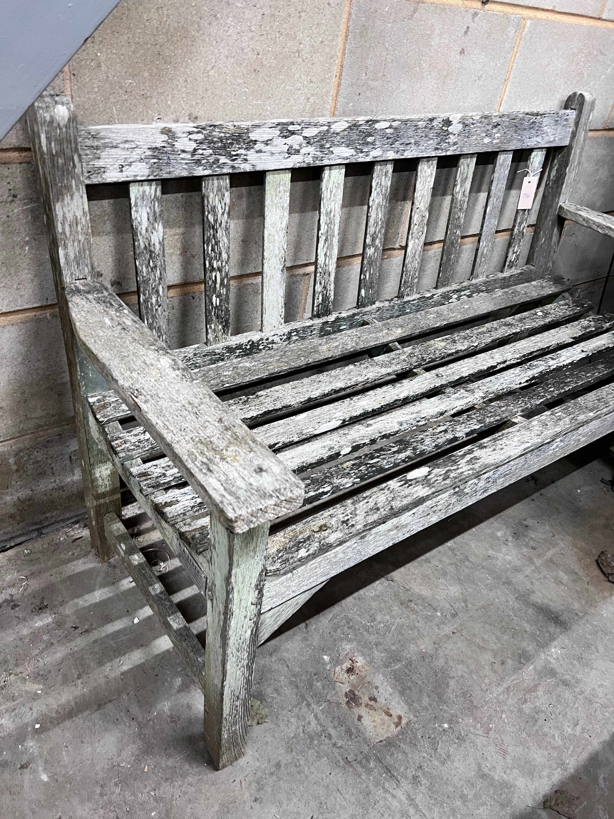 A Lister weathered teak garden bench, length 128cm *Please note the sale commences at 9am.